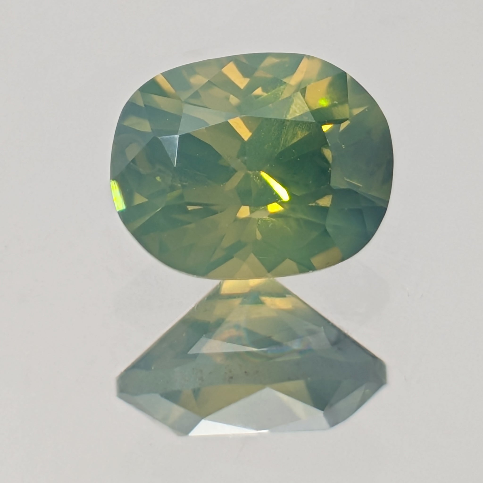 Green Opalescent Sapphire — 1.21 ct (6.7 × 5.3 mm)