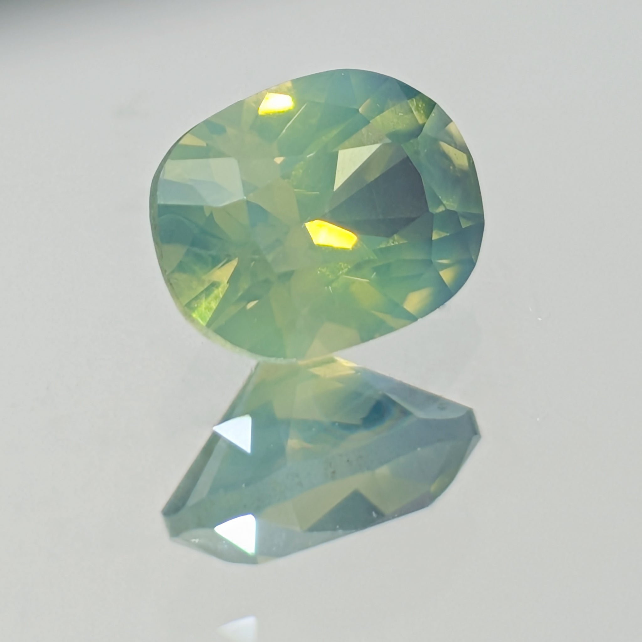 Green Opalescent Sapphire — 1.21 ct (6.7 × 5.3 mm)